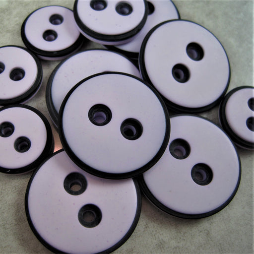 Pale Lilac button with black edging