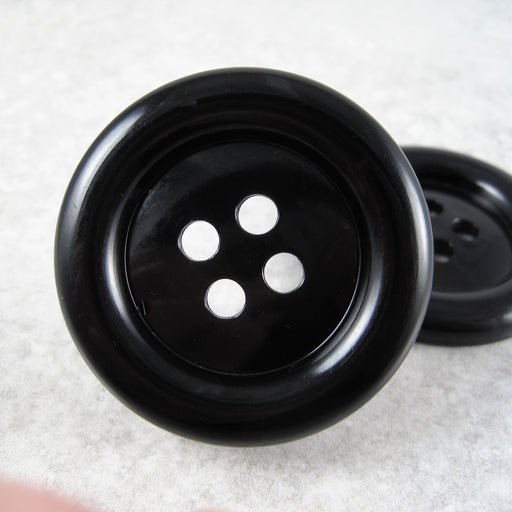 Giant black four hole button