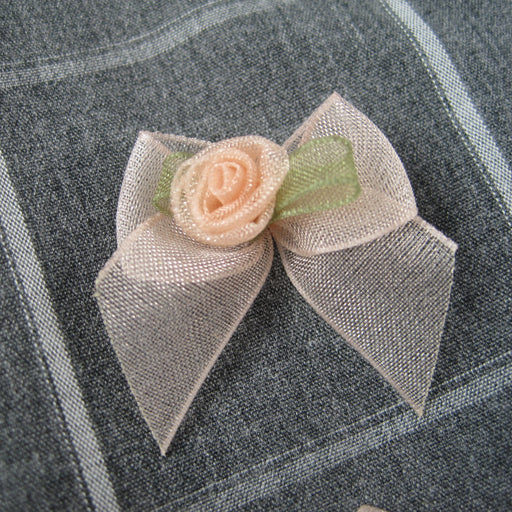 Sheer bow with Peach rose bud