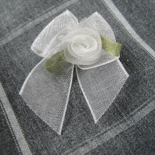 Sheer bow with White rose bud