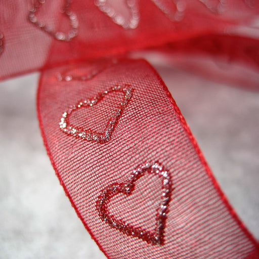 Sheer Red  Ribbon with Heart motif.