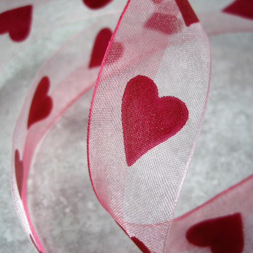 Sheer Pink Ribbon with Red Heart motif.