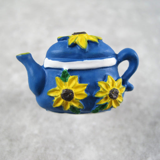Blue teapot button